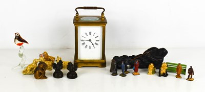 Lot 469 - A French brass carriage clock with Roman...