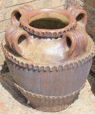 Lot 43 - A Studio ware jar, with four hoop handles and...
