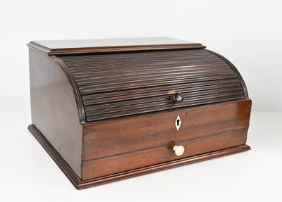 Lot 55 - A 19th century mahogany roll top stationary...