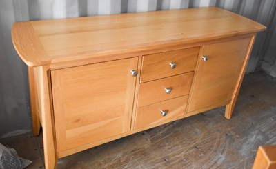 Lot 237 - A modern beech sideboard with three short...
