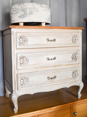 Lot 256 - A painted French style chest of drawers, the...