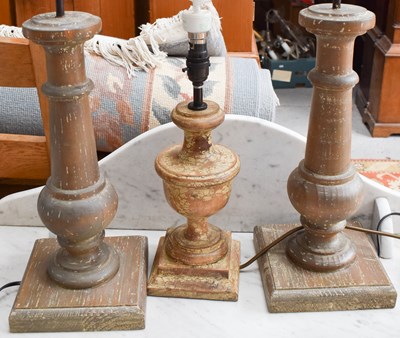 Lot 261 - A pair of wooden table lamps together with a...