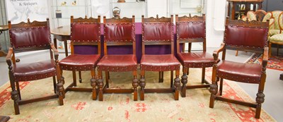 Lot 249 - A set of six oak and red leather dining chairs...