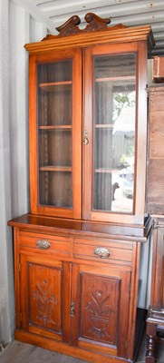 Lot 252 - An Edwardian mahogany book case, the two...
