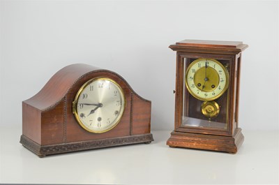 Lot 56 - A mahogany and glass cased eight day mantel...