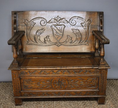 Lot 131 - A 1930s oak Arts & Crafts period metamorphic...