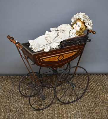 Lot 214A - A Victorian pram together with a modern doll...