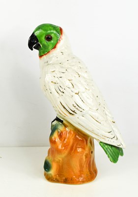 Lot 211A - An early 20th century Staffordshire parrot,...