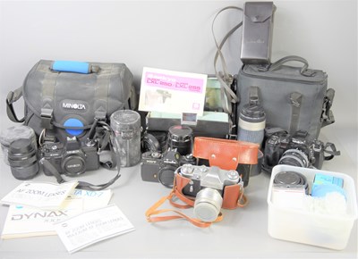 Lot 443 - A group of vintage 35mm cameras to include...