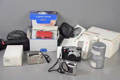 Lot 444 - Three Leica cameras comprising of digilux 4.3,...