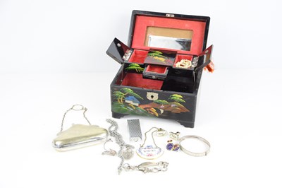 Lot 167 - A silver plated coin purse with foliate...