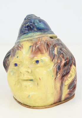 Lot 162 - A Victorian lead glazed money box in form of a...
