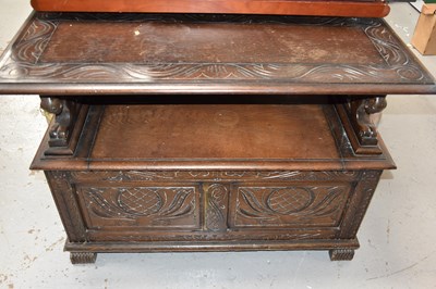 Lot 472 - An oak monks bench/ box settle with carved...