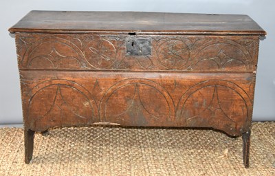 Lot 510 - A 17th century boarded oak coffer with candle...