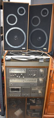 Lot 397 - A vintage Amstrad hi-fi system with record...
