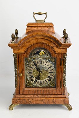 Lot 315 - A Warmink Wuba oak and brass mantle clock with...