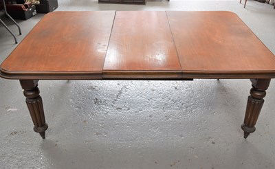 Lot 486 - A Victorian mahogany wind out dining table...