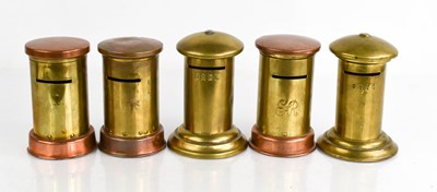 Lot 330 - A group of brass novelty money boxes in the...