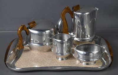 Lot 213 - A mid century Piquot ware tea set and matching...