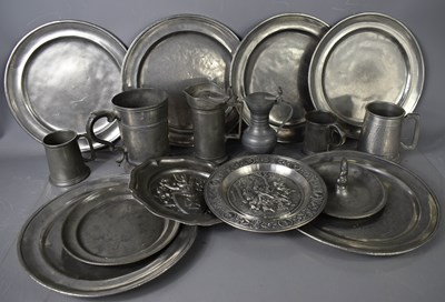 Lot 214 - A selection of pewter chargers, tankards,...