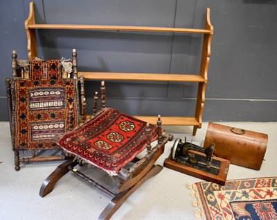 Lot 463 - A pine wall shelf with shaped end boards,...
