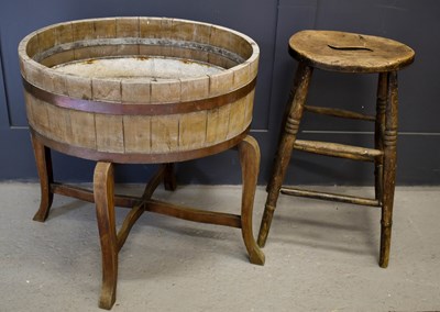 Lot 480 - An antique barrel jardiniere on stand,...