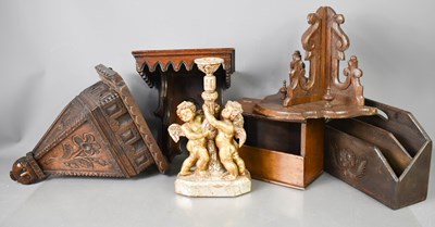 Lot 197 - Three treen carved wall brackets, one...