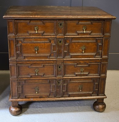 Lot 514 - An 18th century oak geometric moulded splitter...