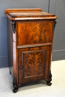 Lot 482 - A 19th century mahogany music cabinet, the top...