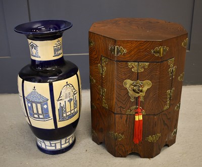 Lot 476 - A Chinese wooden seat / cabinet, with two...