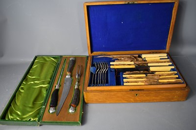 Lot 217 - An oak cased canteen of cutlery together with...