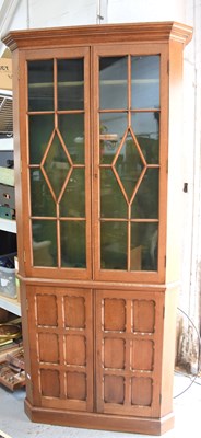 Lot 508 - An oak gun display cabinet, with glazed upper...