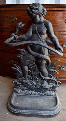 Lot 452 - A cast iron umbrella stand in the form of a...