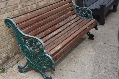 Lot 473 - A cast iron Coalbrookdale style garden bench.