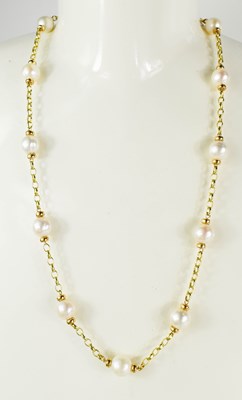 Lot 7 - A 9ct gold and pearl necklace, each pearl...