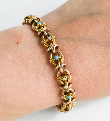 Lot 60 - A 9ct gold bracelet, the oval links set with...