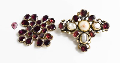 Lot 50 - A Georgian gilt metal, garnet and natural...