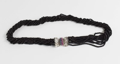 Lot 118 - A 14k white gold, pink and blue sapphire and...