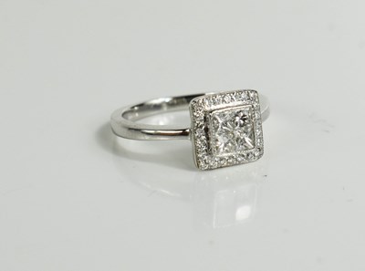 Lot 167 - An 18ct white gold and diamond ring, the...