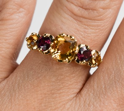 Lot 123 - A 9ct gold Victorian style mixed cut citrine...