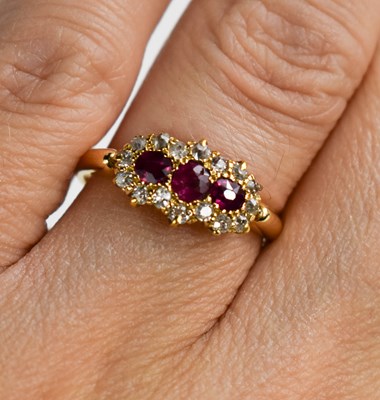 Lot 126 - An 18ct gold, ruby and old cut diamond ring,...