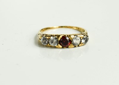 Lot 69 - A 9ct gold, garnet and paste pendant five...