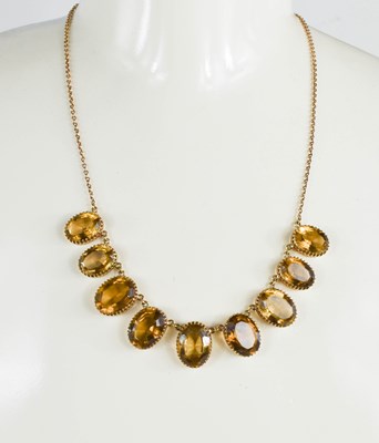 Lot 172 - A 9ct gold and citrine necklace, with...