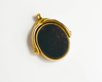 Lot 81 - An antique 10ct gold swivel fob with inset...