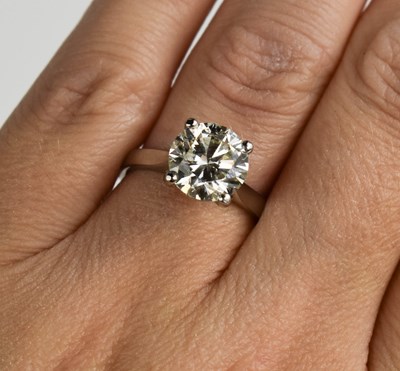 Lot 180 - A stunning platinum and diamond solitaire ring,...