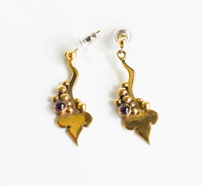 Lot 76 - A pair of 9ct gold and garnet cabochon drop...