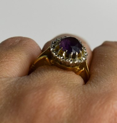 Lot 44 - An 18ct gold, diamond and amethyst ring, the...