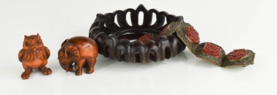 Lot 568 - Two Japanese inro carved beads, together with...