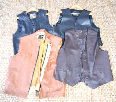 Lot 271 - A group of leather biker waistcoats, various...