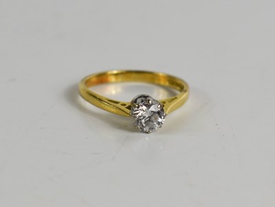 Lot 361 - An 18ct gold and diamond solitaire ring, the...